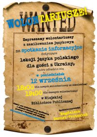 Grafika: jasno brązowy zwój papieru  napisami Wolontariusze wanted. Treść: informacje o spotkaniu dla wolontariuszy
