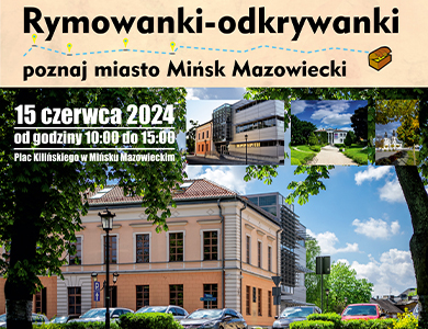 Kremowy budynek. Przed nim na parkingu samochody pod drzewami